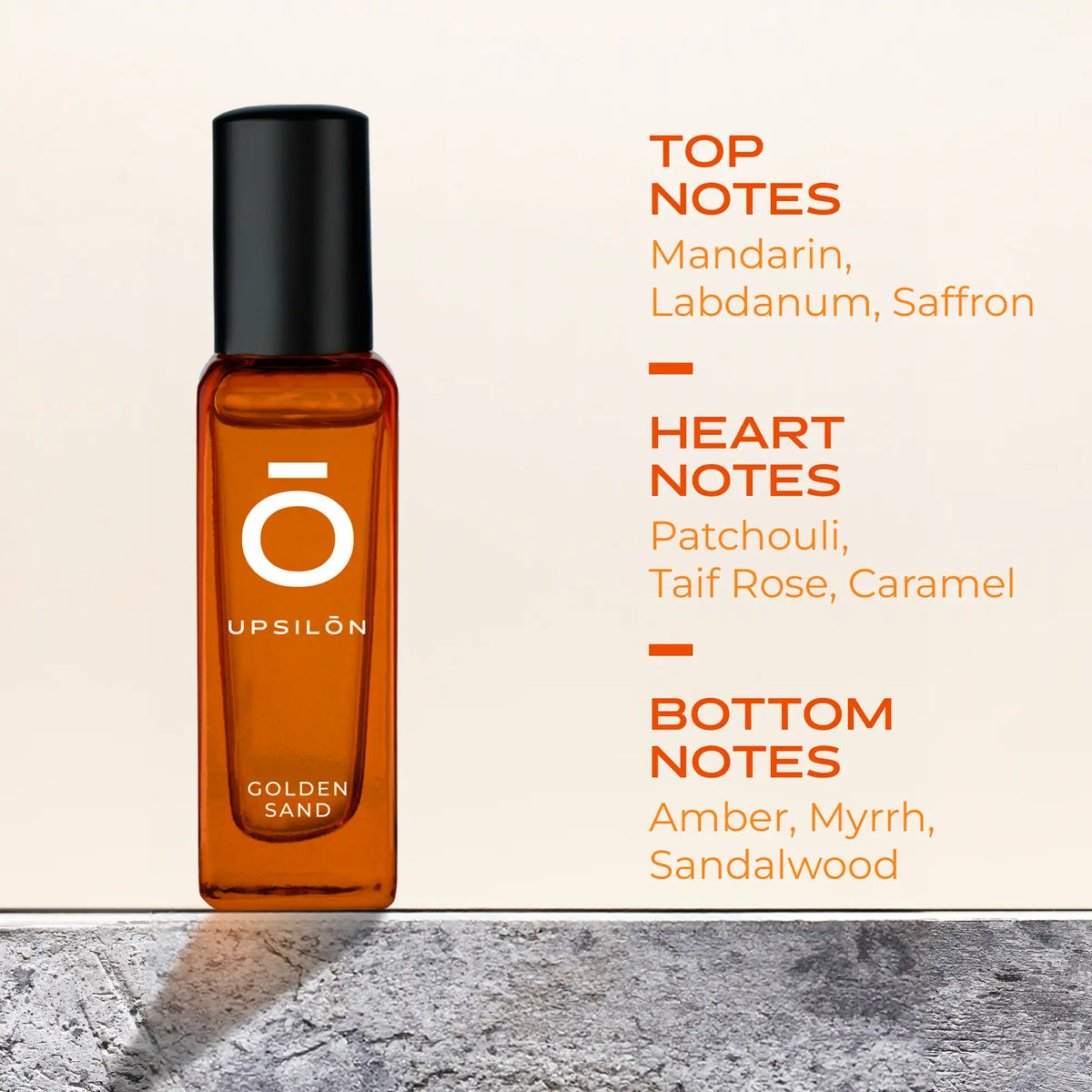 A luxurious bottle of Upsilon Golden Sand Eau de Parfum for Men, a long-lasting and powerful fragrance featuring top notes of mandarin, lavender, saffron, and patchouli, heart notes of Taif rose and caramel, and base notes of amber,