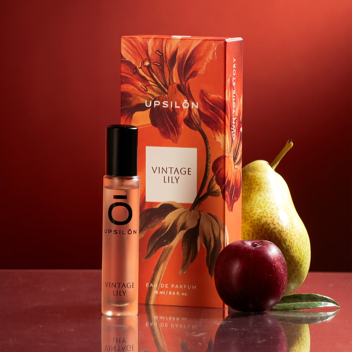 A travel-sized bottle of Upsilon Eau de Parfum Lily perfume for women