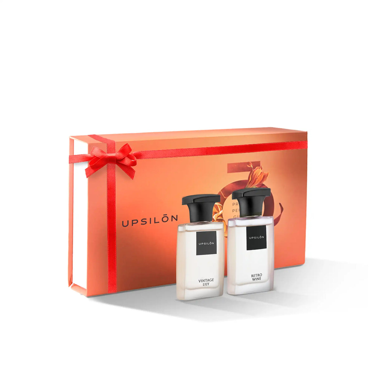 Double the fragrance delight: A beautifully wrapped gift box containing two Upsilon Eau de Parfum bottles, Vintage Lily for women and Retro Wine for men.