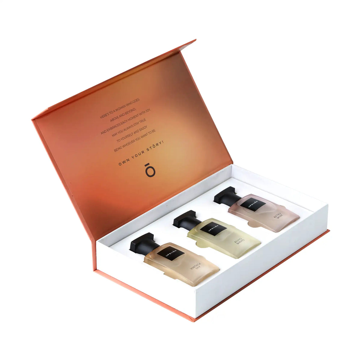 A set of three Upsilon Eau de Parfum bottles in a gift box