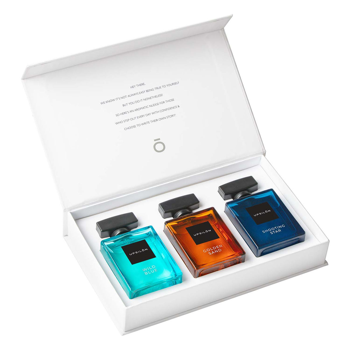 A gift set of three Upsilon Eau de Parfum for men, featuring Wild Blue, Golden Sand, and Shooting Star fragrances.
